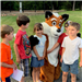 Children in front of fox mascot