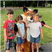 Children in front of fox mascot