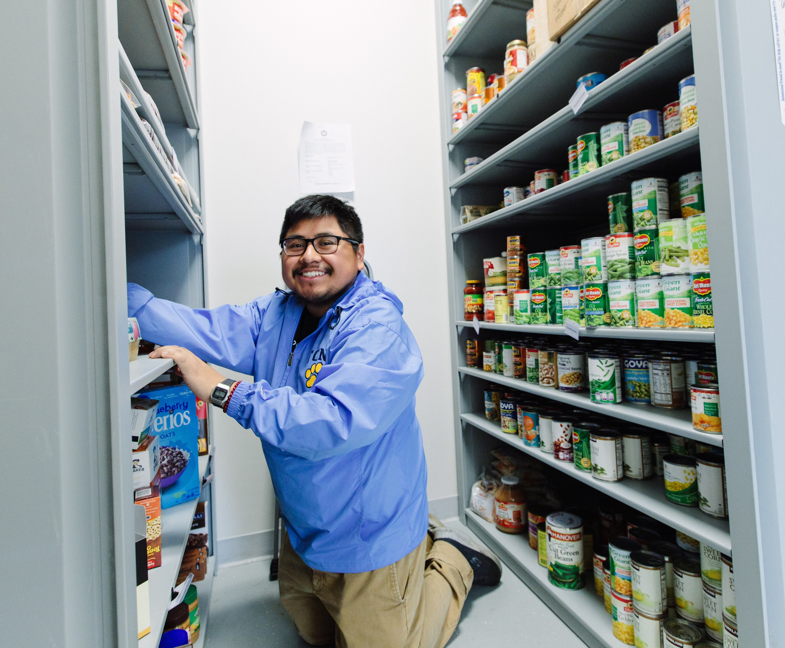Horacio Hernandez stocking shelves