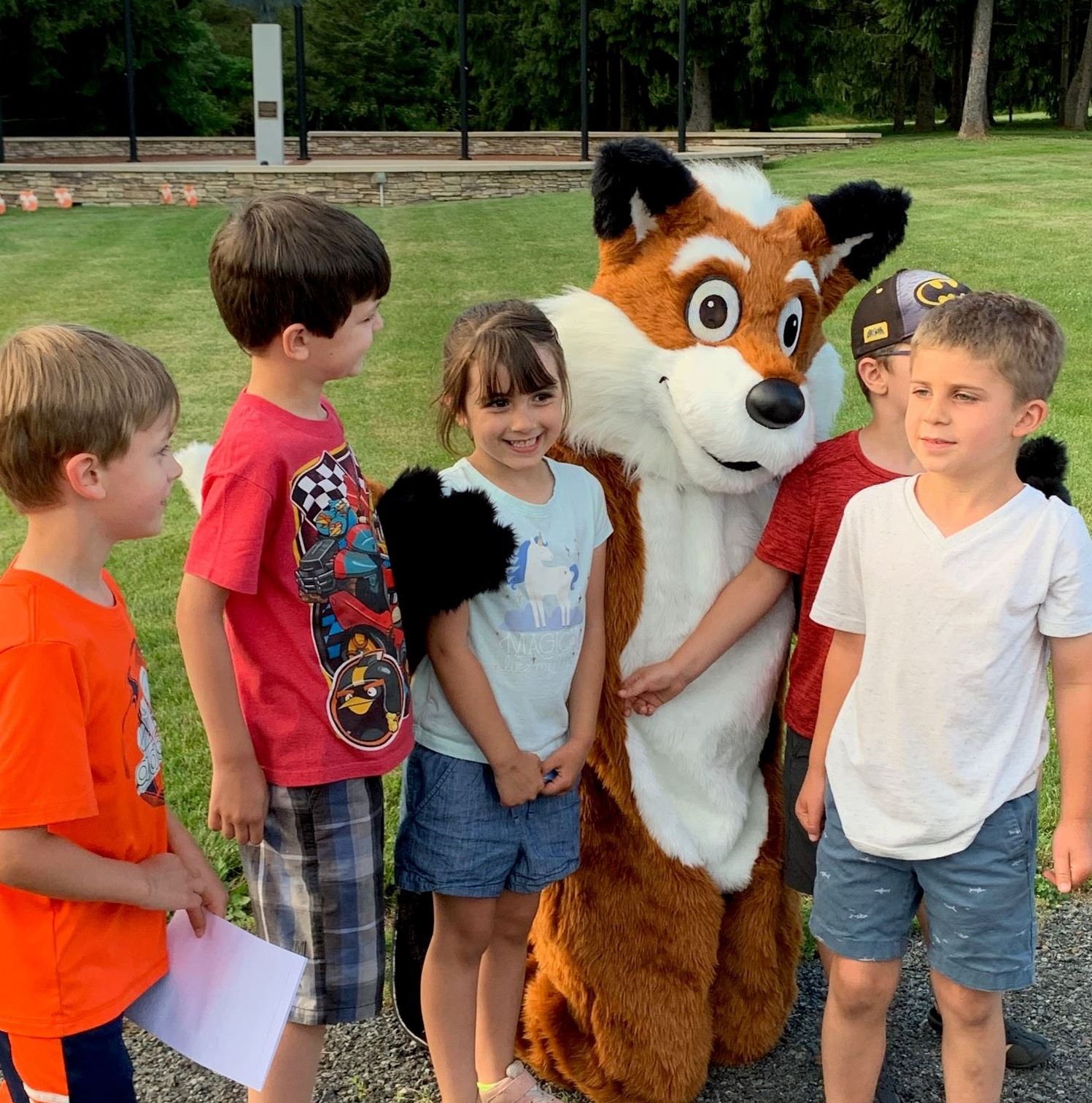 Children in front of fox mascot