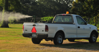 mosquito spraying pickup truck
